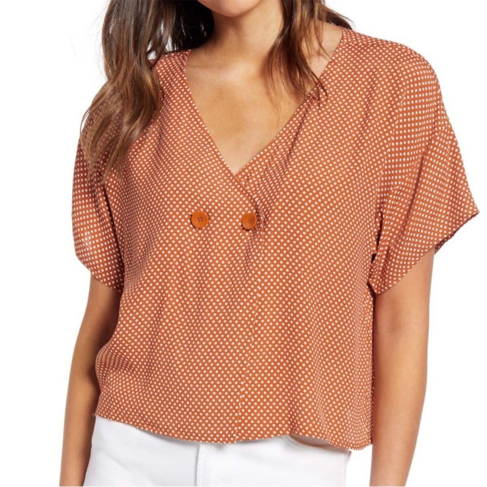 Polka dot blouse with button detail